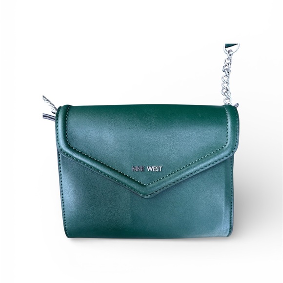 Stunning 9 West crossbody purse. Brand new.
Holds everything you need! - Picture 2 of 6